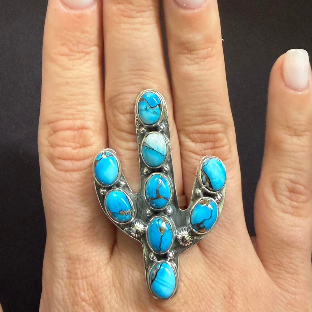 Sterling silver handmade turquoise catches ring adjustable size
